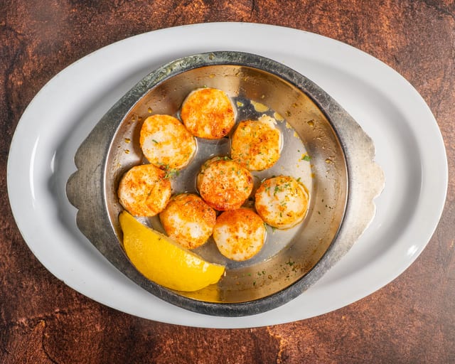 Broiled Scallops in Butter Lemon Sauce.