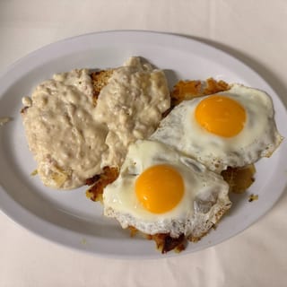 Sausage Gravy Over Biscuits with Two Eggs